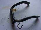 1996 Honda Foreman 400 4WD Front Headlight Bracket Mount Used. Price: $24.00.