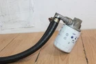 2010 Kubota RTV1100 Diesel Hydraulic Filter Bracket W/hoses Used. Price: $25.00.