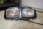 90-97 Honda TRX200D Type Headlights W Grille 66300-HF1-670ZA Used. Price: $98.50.