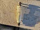 12 Polaris Outlaw 90 2X4 Rear Shock Used. Price: $20.00.