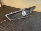 #A369 10-13 Kawasaki Teryx 750 Oem Left Lamp Trim Bezel Used. Price: $75.00.