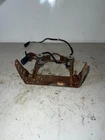 1986 Honda Fourtrax 350 Headlight Case BRACKET/61310-HA7-670 Used. Price: $40.00.